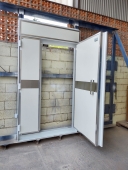 Porta para sala de radioterapia pivotante (2 folhas) manual